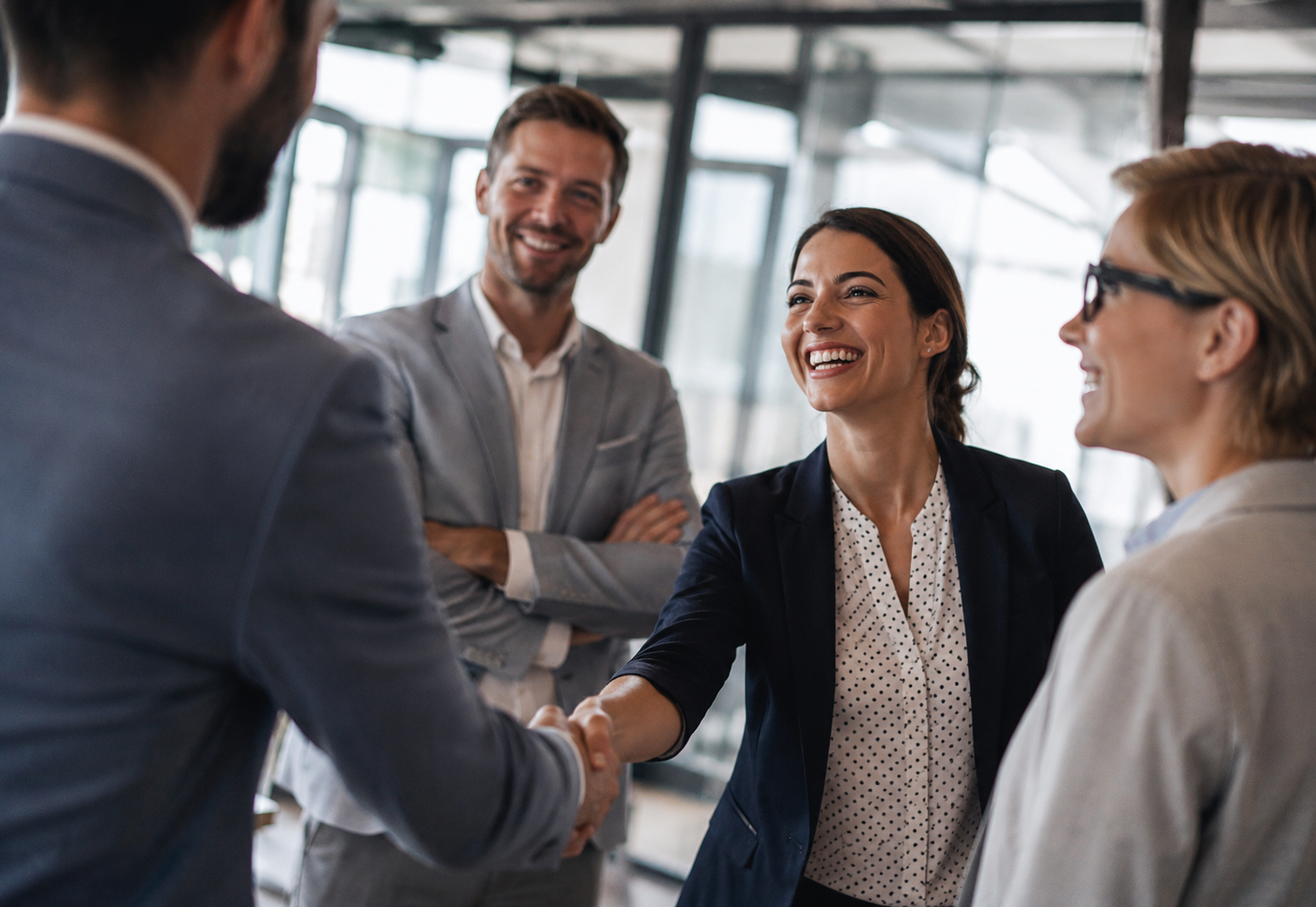 New hire warmly greeted by colleagues